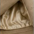 Close-up of the silk lining inside the waistband.